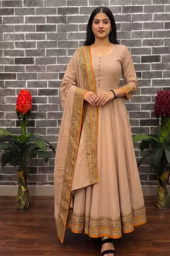 New trendy stylish cream solid anarkali kurta with traditional golden border dupatta set