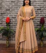 New trendy stylish cream solid anarkali kurta with traditional golden border dupatta set