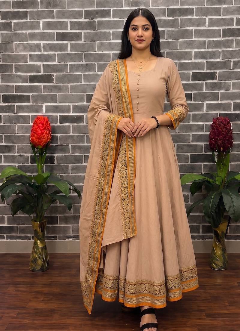 New trendy stylish cream solid anarkali kurta with traditional golden border dupatta set