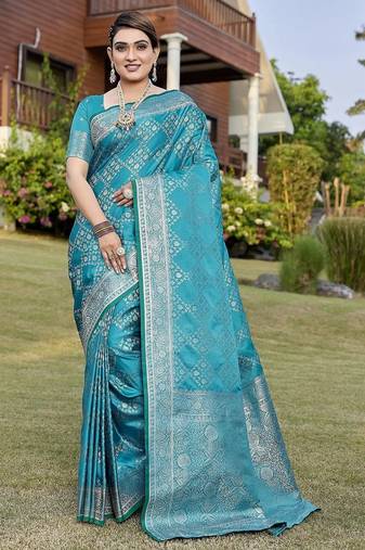 Teal zari woven art silk traditional saree with unstitched blouse