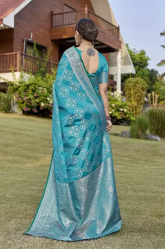 Teal zari woven art silk traditional saree with unstitched blouse