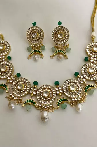 The emerald kundan necklace earring set