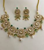 The emerald kundan necklace earring set