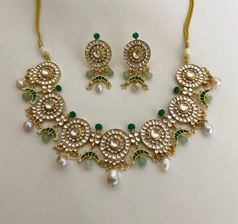 The emerald kundan necklace earring set