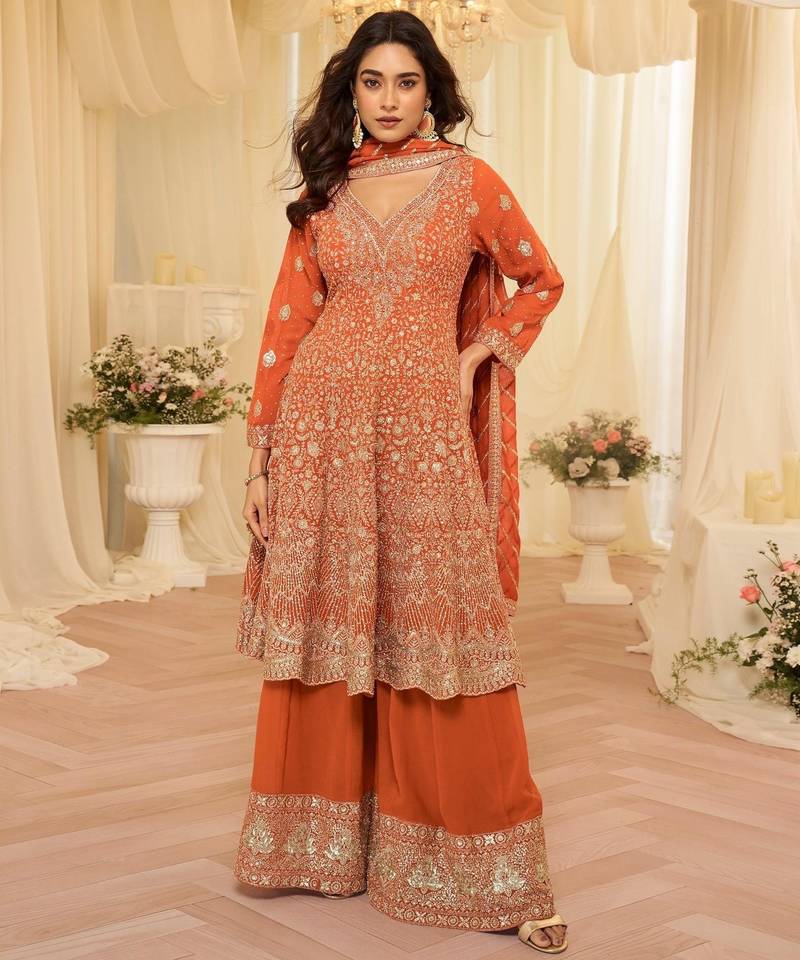 Orange georgette free size stitched suit with embroidery & zarkan work