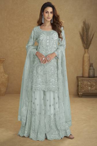 Blue net free size stitched suit with embroidery & hand work