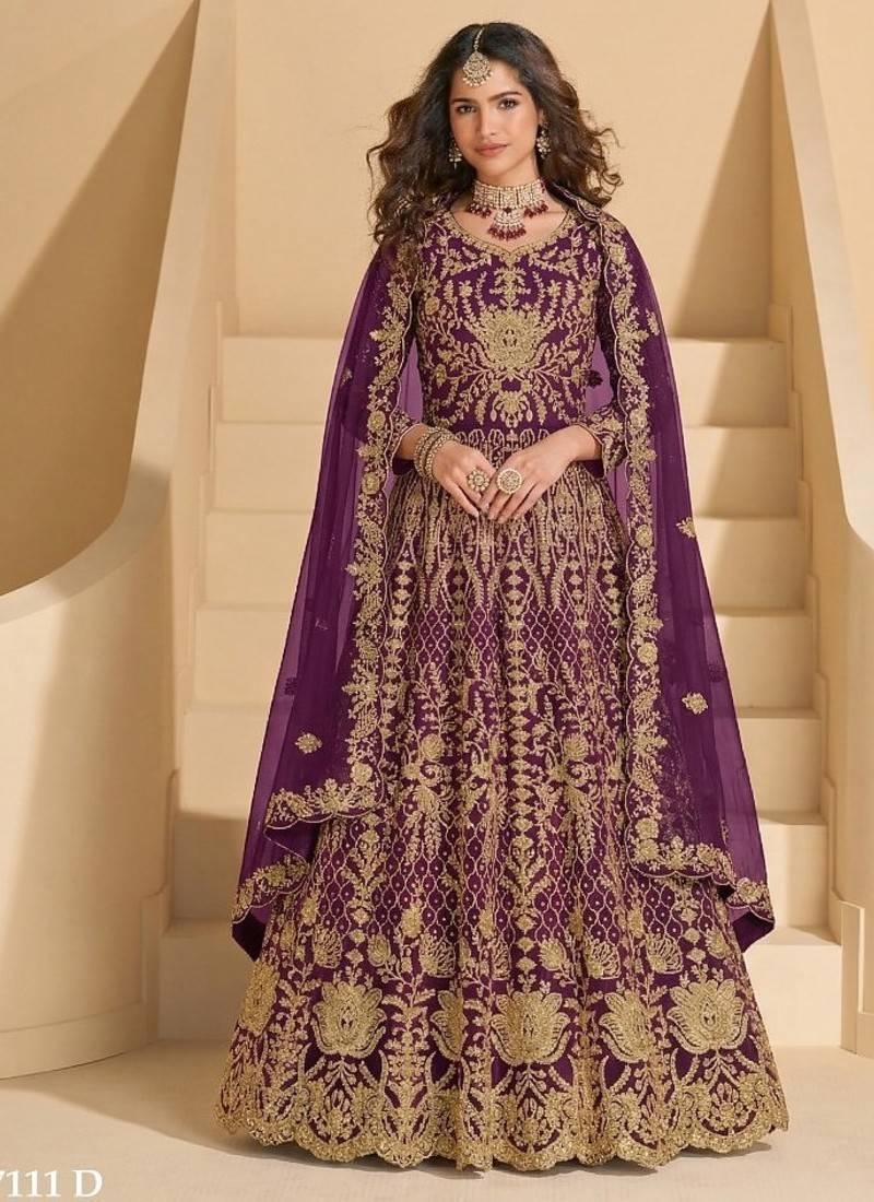 Purple net semi stitched anarkali suit with codding & stone work