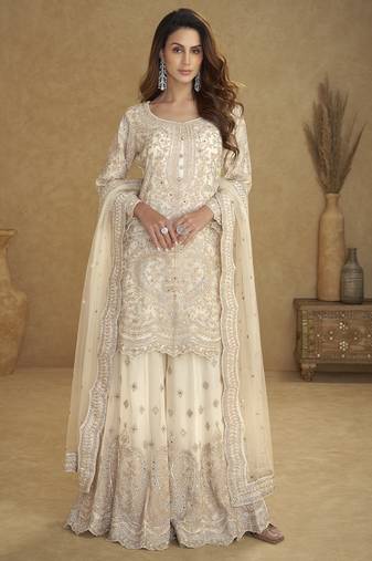 White net free size stitched suit with embroidery & hand work