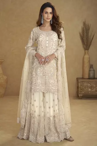 White net free size stitched suit with embroidery & hand work