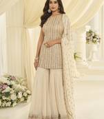 White georgette free size stitched suit with embroidery & zarkan work
