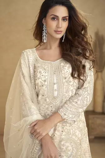 White net free size stitched suit with embroidery & hand work