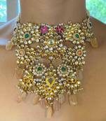 The grand floral multi-color kundan necklace & earring sets