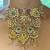 The grand floral multi-color kundan necklace & earring sets