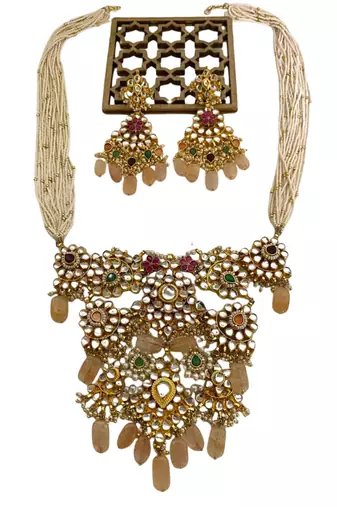 The grand floral multi-color kundan necklace & earring sets