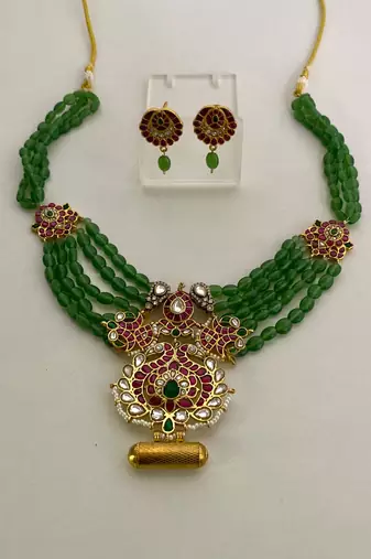 Emerald kundan floral necklace & earring set