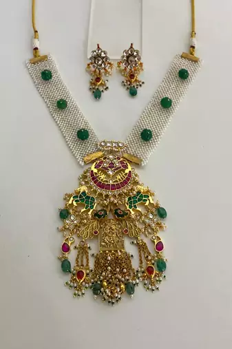 The royal peacock kundan necklace & earring set