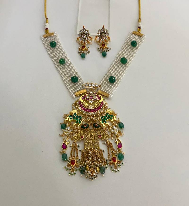 The royal peacock kundan necklace & earring set