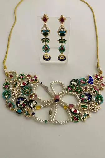 The multicolor kundan floral necklace & earring set