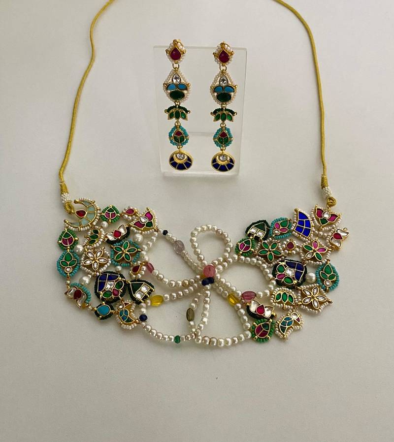 The multicolor kundan floral necklace & earring set