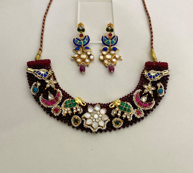 The peacock elephant kundan necklace & earring set