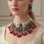 The ruby emerald peacock kundan set