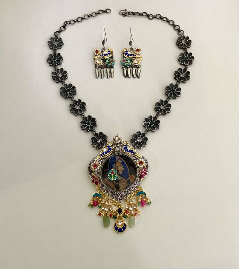 The peacock portrait necklace & earring set
