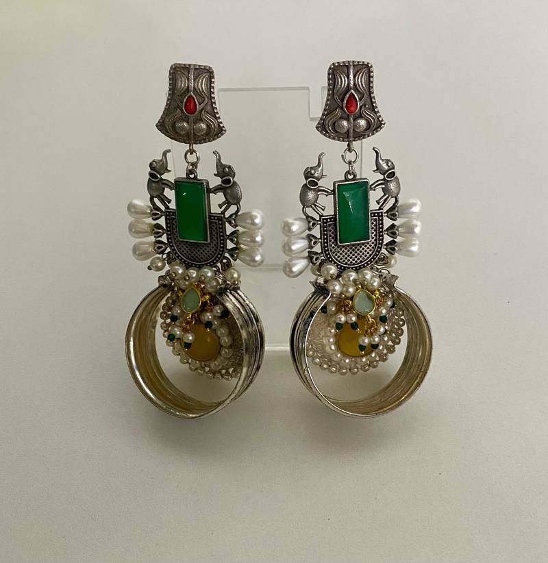 The regal elephant fusion earrings