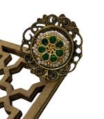 The emerald bloom kundan ring