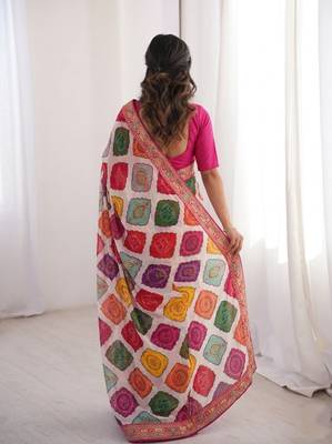 Multi white clr rajwadi bandhej print saree with solid blouse  4