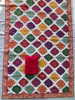 Multi white clr rajwadi bandhej print saree with solid blouse  5