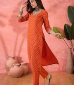 orange floral printed silk blend v-neck straight kurta with trousers