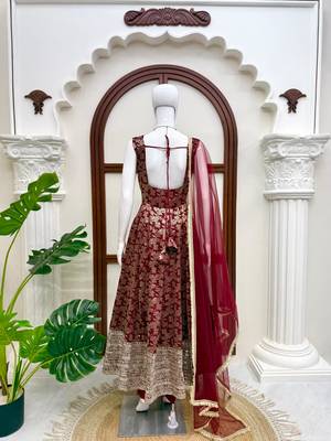 Maroon colour chanderi jacquard butti anarkali suit set with soft net dupatta 3