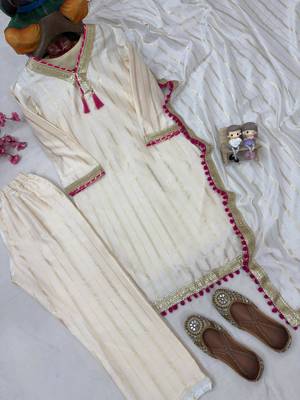 Cream colour  chanderi silk kurti pant set with lace work dupatta 3