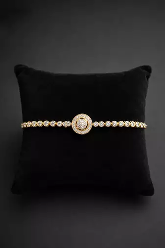 Premium gold adjustable tennis bracelet with round halo crystal centerpiece for women