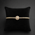 Premium gold adjustable tennis bracelet with round halo crystal centerpiece for women