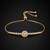 Premium gold adjustable tennis bracelet with round halo crystal centerpiece for women