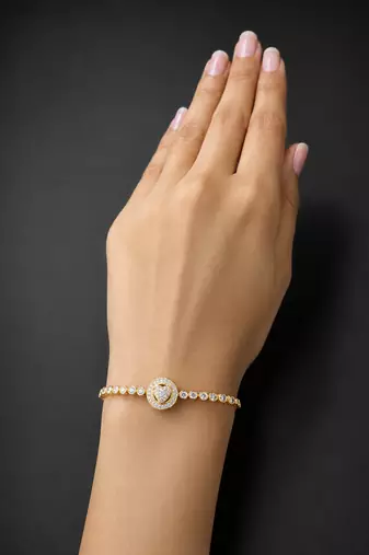 Premium gold adjustable tennis bracelet with round halo crystal centerpiece for women