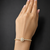 Premium gold adjustable tennis bracelet with round halo crystal centerpiece for women