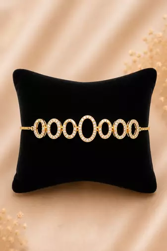 Premium gold adjustable bracelet with oval crystal link design for women
