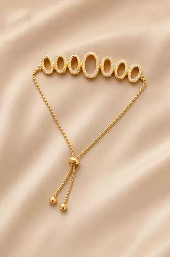 Premium gold adjustable bracelet with oval crystal link design for women