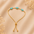 Premium moving solitaire geometric teardrop slider bracelet in yellow gold plating
