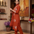 Vibrant orange embroidered kurti with pant and dupatta set