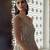 Champagne gold embroidered tissue short kurta sharara set