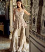 Metallic gold embellished tissue peplum kurta sharara set