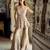 Metallic gold embellished tissue peplum kurta sharara set