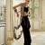 Black embroidered cape tissue pickup skirt set
