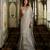 Champagne silver embroidered tissue pre drape saree set