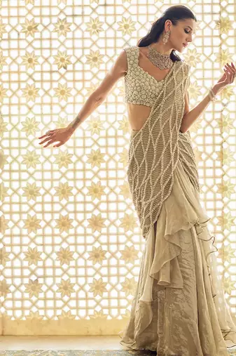 Light gold ruffle embroidered tissue pre drape saree set
