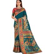 Blue position print with zari weaving saree with contrast blouse piece