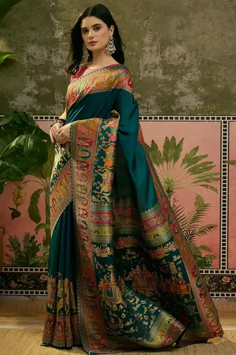 Blue position print with zari weaving saree with contrast blouse piece